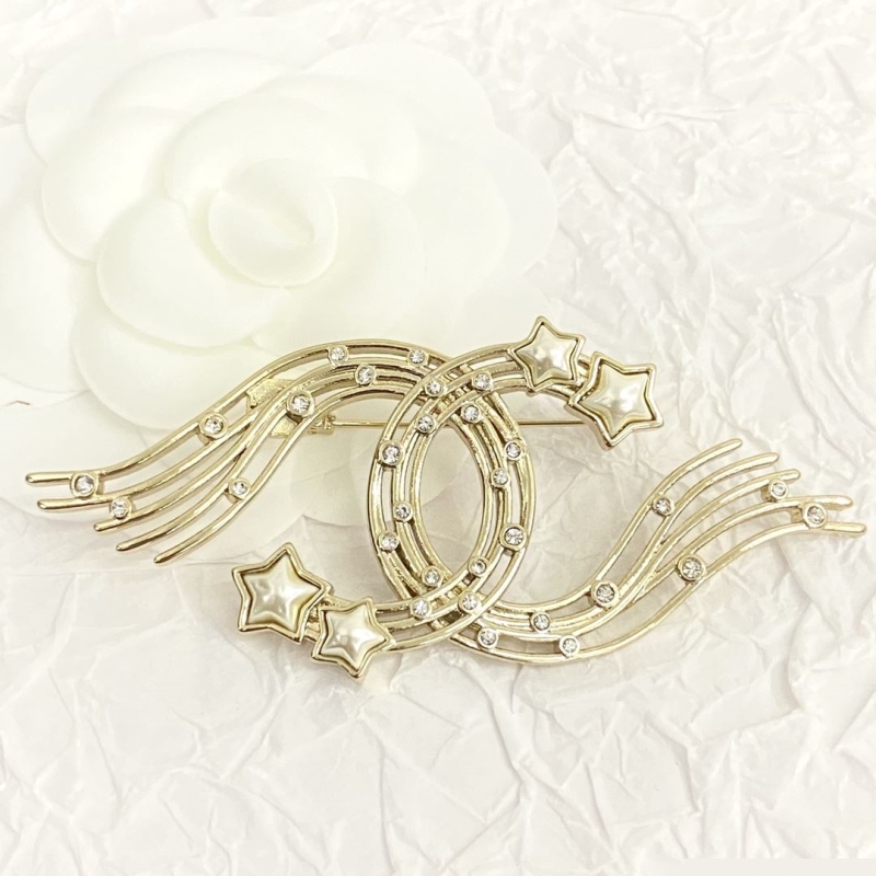 Ch*el brooches